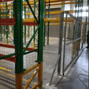 Steel scaffolding and protective barriers on an industrial site