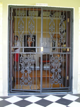 Ornamental steel home security gate